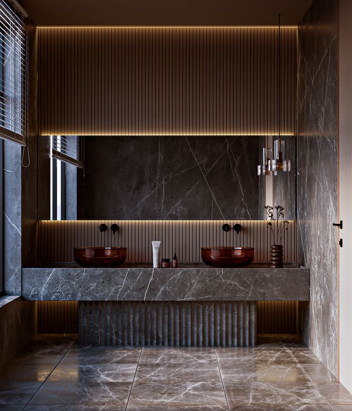 Home Elegant modern bathroom with marble design, double sink, and ambient warm lighting.